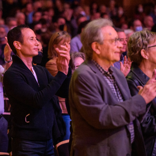 The audience applauses for NatPhil at the end of a concert.